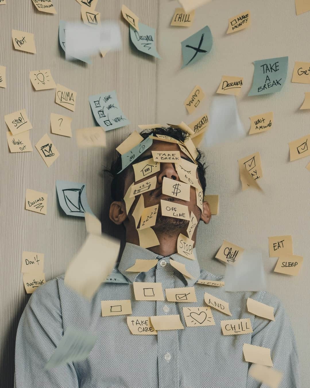 man with post-it nots all over his face