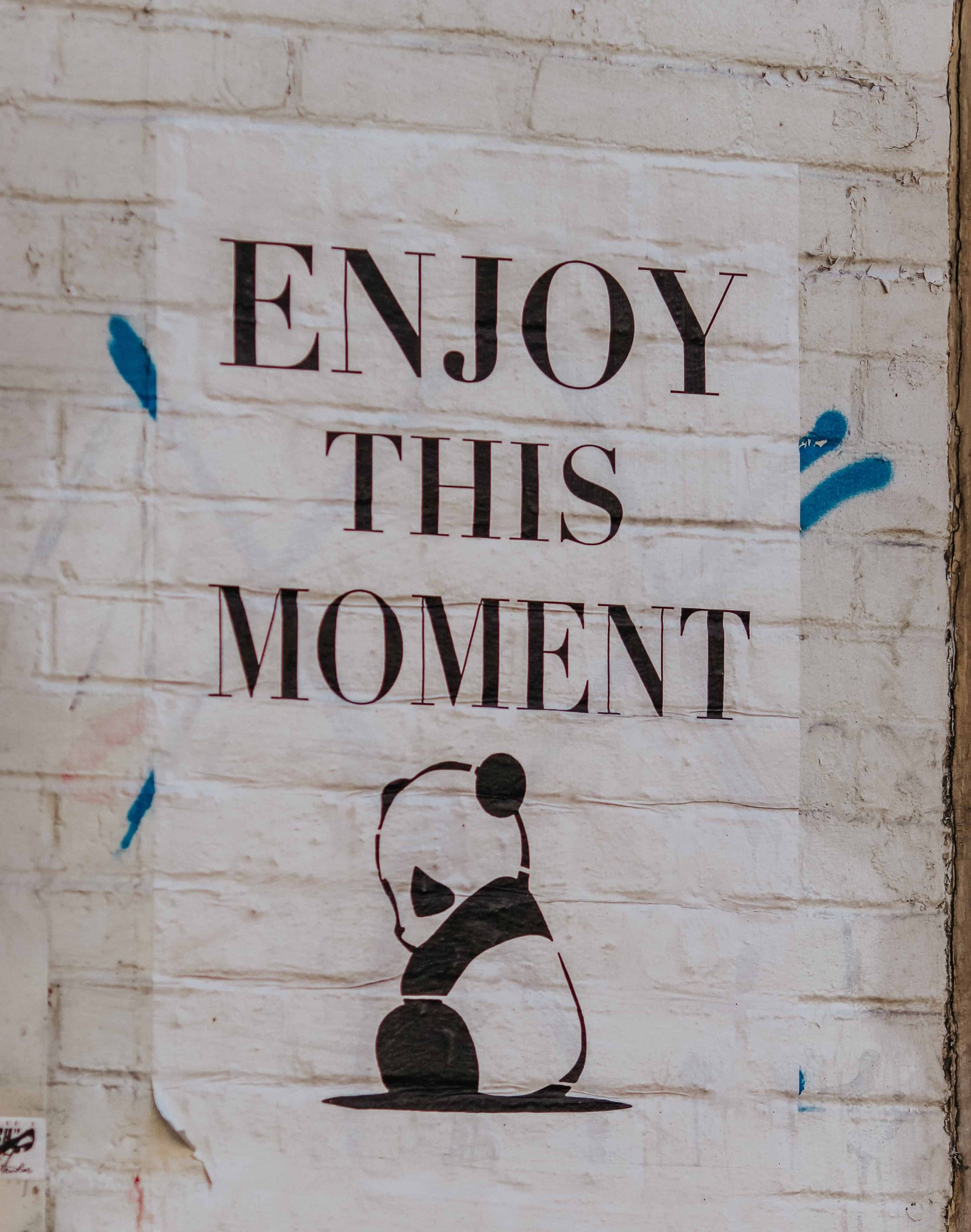 sign that says enjoy this moment
